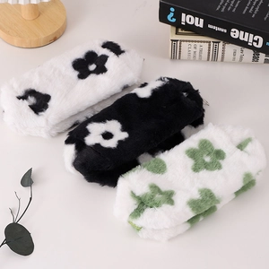 Cute plush pencil case with floral patterns and top zipper for school stationery storage