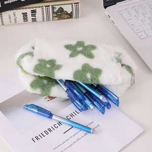 Detailed view of fluffy white pencil case with green flowers and large storage capacity