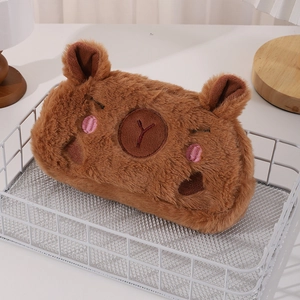 Close-up of soft brown plush Capybara pencil case with cute embroidered animal features