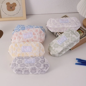 Quilted floral pencil cases in multiple colors with sweet girl label and zipper
