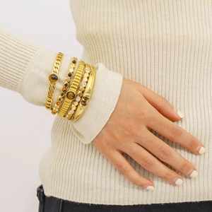 Elegant gold-plated stainless steel bangle set featuring natural tiger eye and pearls