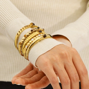 5-piece gold layered open bangle set featuring natural stones and pearl accents