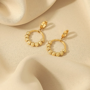 Elegant 18K gold plated stainless steel hoop earrings with textured faceted beads