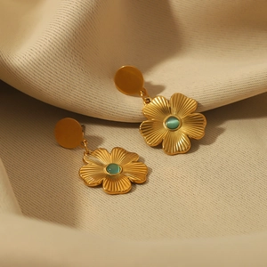 French vintage 18k gold plated floral earrings featuring green cat eye stone inlays