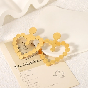 Exaggerated 18k gold stainless steel hollow heart earrings with overlapping disk design