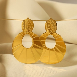 Modern U-shaped drop earrings with 18k gold plating and textured hollow design