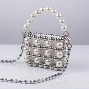 Mini handmade pearl and silver beaded evening bag with top handle and crossbody chain