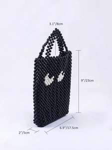Vue détaillée du sac à main en perles fait main avec motif œil et dimensions