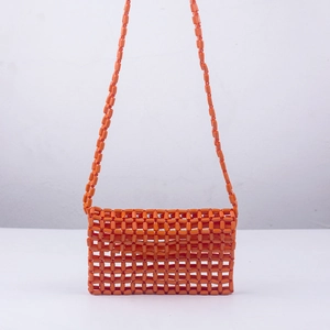 Handmade orange acrylic beaded crossbody bag with hollow grid pattern and long strap