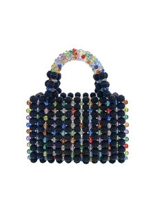Detail of handmade beaded handbag with black matte beads and colorful crystal accents