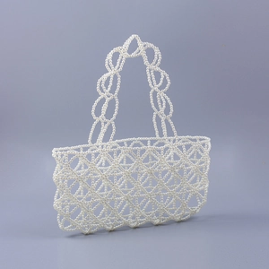 Sac à main élégant en perles blanches fait main avec maille géométrique ajourée tissée