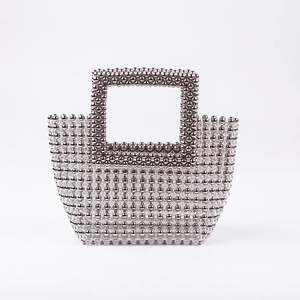 Handmade beaded evening bag with silver metal and clear acrylic beads in a square shape