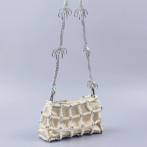 Elegant champagne satin pearl crossbody bag with crystal grid and bow chain strap
