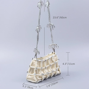 Detail of pearl lattice evening bag with crystal bows and silver chain strap dimensions
