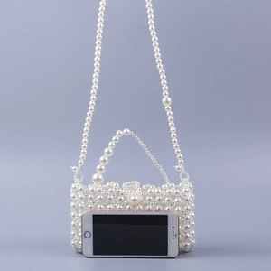 Handmade white pearl beaded crossbody bag for women with round handle and phone comparison