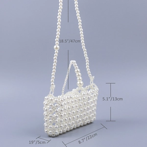 Detailed view of handmade pearl crossbody bag with precise size and strap measurements