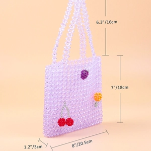 Detailed size chart of handmade beaded fruit handbag with dimensions in inches and cm