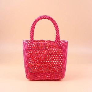 Vibrant rose red flower shaped beaded handbag with stylish round pearl handles