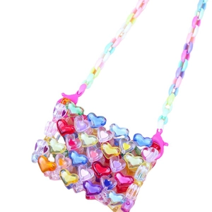 Mini colorful heart-shaped acrylic beaded crossbody bag with a rainbow chain strap