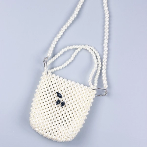 Handmade pearl woven mini crossbody bag with black bead accents and dual pearl straps