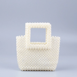Elegant white faux pearl woven handbag featuring a minimalist top-handle square design