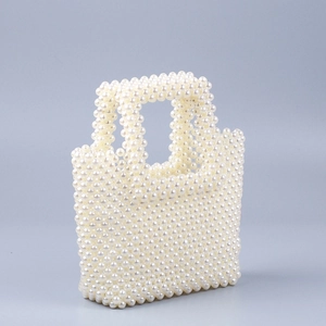 Handmade pearl woven tote bag with large capacity and double handles in white finish