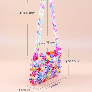 Detail view of handmade colorful acrylic heart beaded bag with size specifications