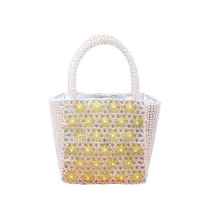 Handmade pearl tote bag with yellow floral acrylic beads and elegant satin lining