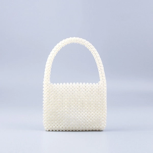 Elegant white handmade faux pearl beaded handbag with rounded top handle for women
