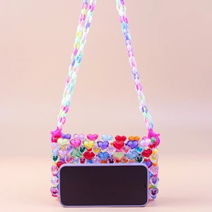 Handmade colorful acrylic heart beaded crossbody bag with vibrant shoulder strap