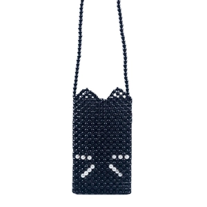 Handmade black beaded crossbody bag with cat ear shape and white whiskers pattern