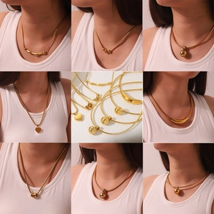 18K gold plated necklace set with heart and sphere pendants on fine snake chains