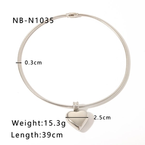 Detail view of 18k gold plated heart pendant necklace with dimensions and weight specs
