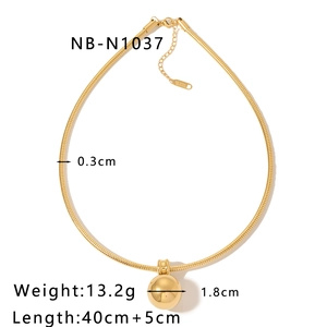 Close-up of 18k gold heart ball pendant with 0.3cm snake chain and lobster clasp