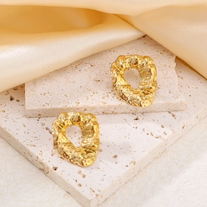 French vintage hammered stainless steel hoop earrings in gold with lava texture finish