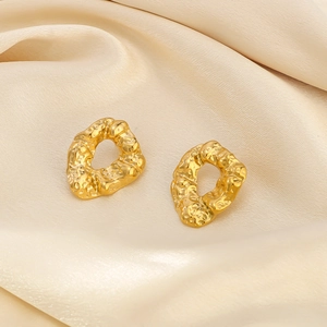 French vintage hammered stainless steel irregular gold earrings on silk fabric