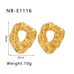 Detail of hammered texture gold irregular earrings showing size 30mm and weight 10g