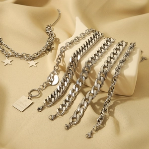 Cuban chain bracelet and star pendant necklaces set in polished stainless steel finish