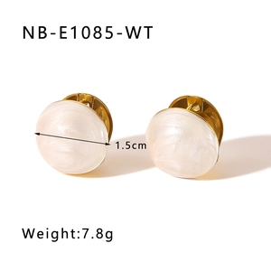 Close-up of turquoise dome stud earrings in 18k gold finish showing 1.5cm diameter size