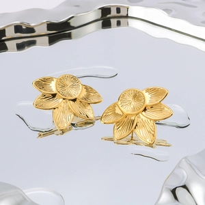 Polished 18K gold-plated stainless steel flower stud earrings with brushed textures