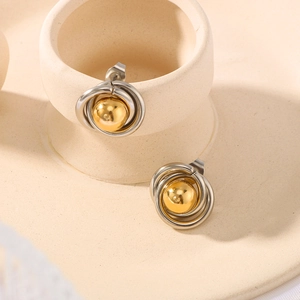 Minimalist geometric planet stud earrings with golden beads and silver ring layers
