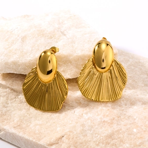 Elegant 18k gold plated stainless steel leaf texture earrings on light stone pedestal