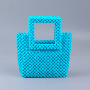 Handcrafted bright blue acrylic beaded tote bag with minimalist square top handles