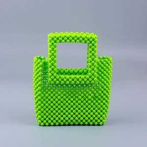 Handmade vibrant green acrylic beaded handbag with square top handle for women