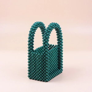 Handmade emerald green pearl beaded mini tote bag for elegant evening party and gala occasions