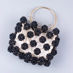 Handmade black beaded ball evening bag with gold metal rings and luxury satin lining