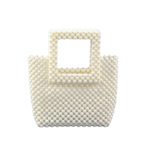 Handmade cream acrylic pearl beaded handbag with a rectangular design and integrated handle