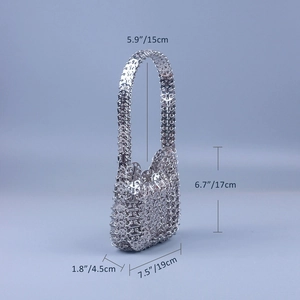 Detail showing dimensions of silver sequin bag with metal chain handle and height 17cm
