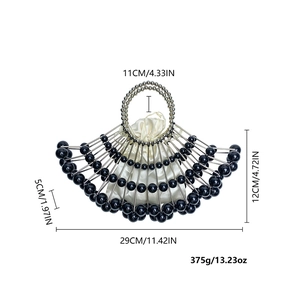 Detailed dimensions of fan-shaped beaded clutch with metal frame and pearl details