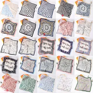 Grid view of various 70cm square silk scarves with leopard and vintage patterns